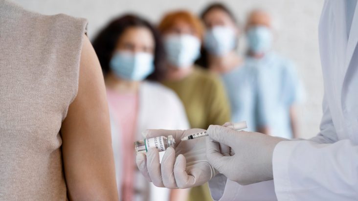 woman-getting-vaccine-shot-by-doctor_web